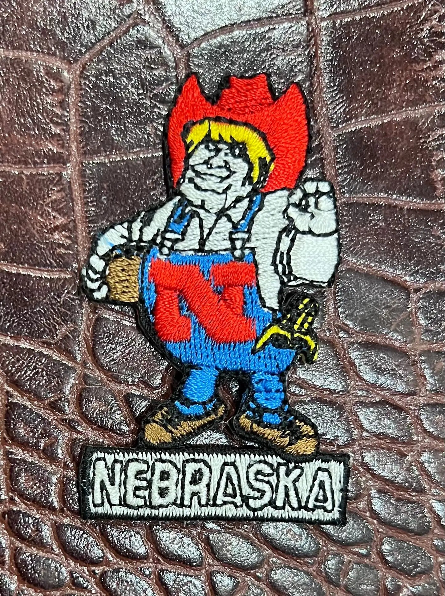 NEBRASKA CORNHUSKERS PATCH Set for the NCAA fanatic or alumni. These are vintage items, and make a great deal as sold in a set