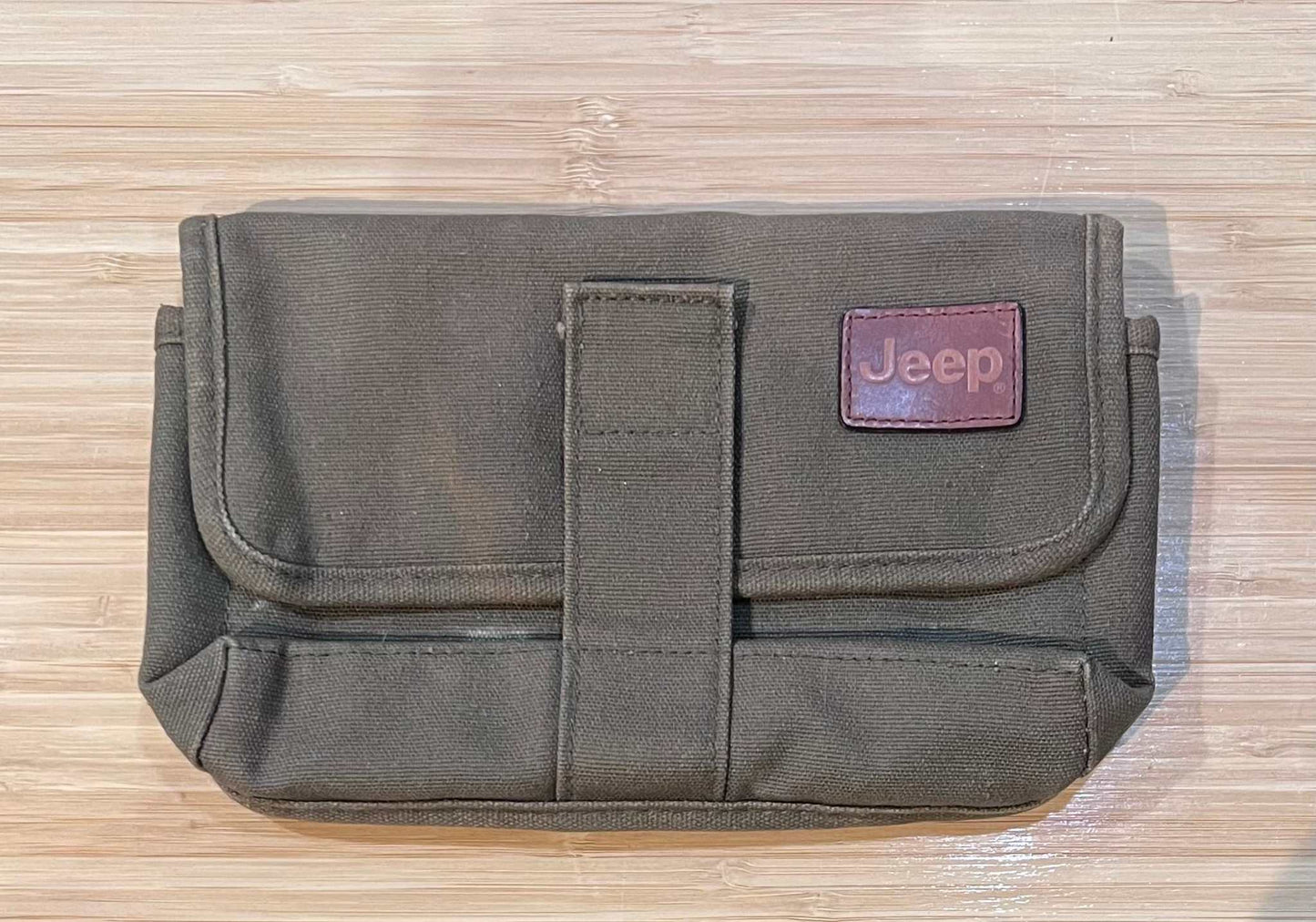 Jeep Canvas Manual and Storage Holder from 2005 TJ Collectors N.O.S. Relic has been safely stored away for last 20 years and would make for a great replacement or gift
