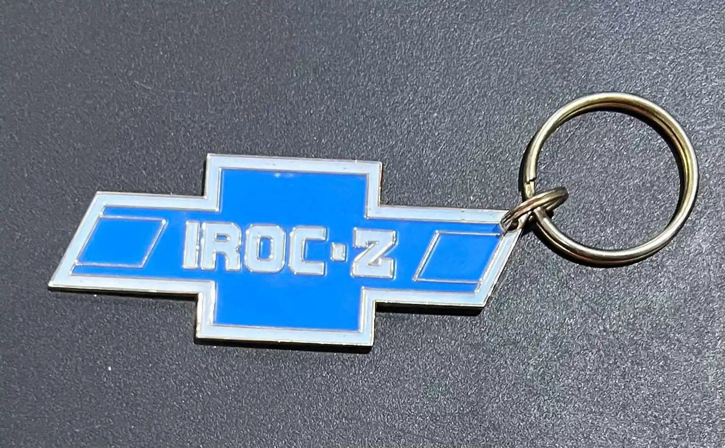 Iroc Z Chevy Bowtie Die Cut Metal Keychain Engravable Backside NOS Relic has been store safely away for decades and shows some wear but vintage from the 1980s