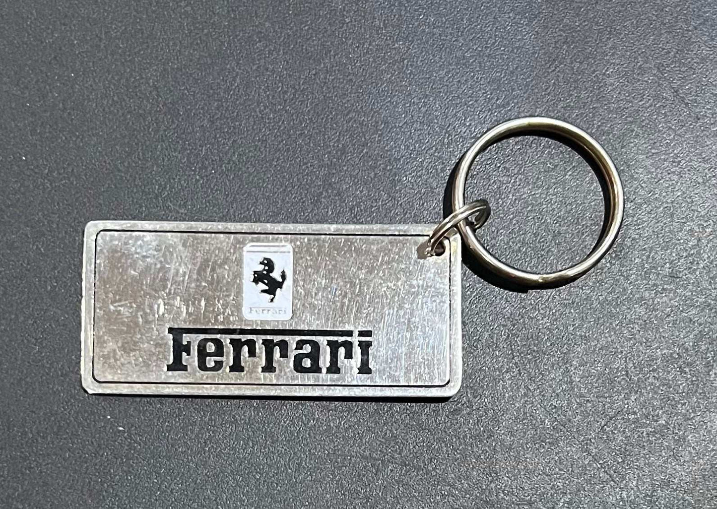 Ferrari Logo Gold Plated Metal Keychain with Engravable Backside NOS Relic has been store safely away for decades and shows some wear but vintage from the 1980s