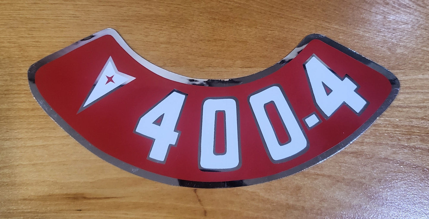 Pontiac 400 4V Air Cleaner Red and Silver Metallic Decal EXC Restoration. Relic has been stored safely away for decades and measures approx 3 in wide x 8.75 in leng