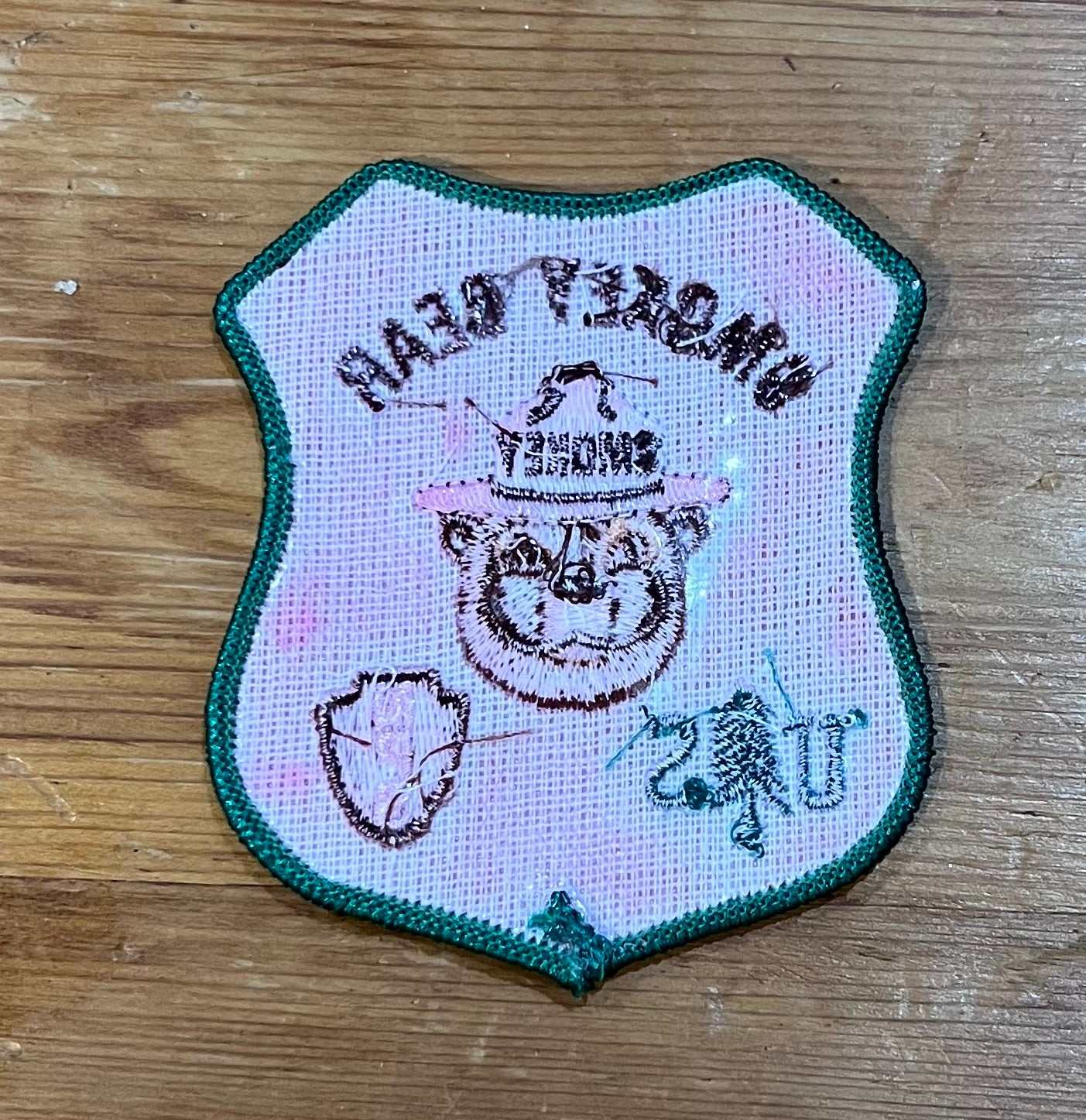 Smokey Bear US National Parks Service Vintage Patch NOS Nature Wildlife Relic has been safely stored away for decades and measures approx 3 inches x 3.5 inch shield