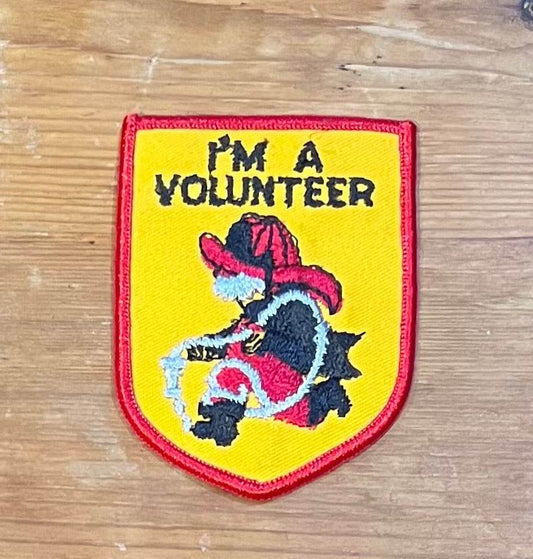 I am A Volunteer Firefighter Character Vintage Shield Patch Eclectic NOS EXC Condition Relic has been safely stored away for decades and the badge uniquely measures