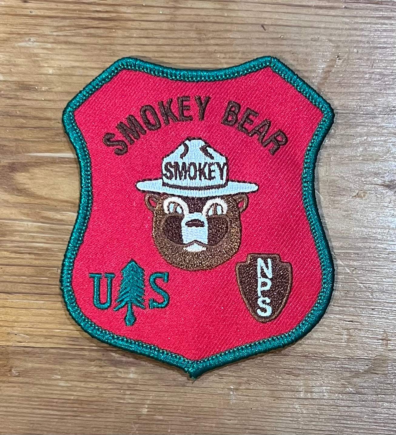 Smokey Bear US National Parks Service Vintage Patch NOS Nature Wildlife Relic has been safely stored away for decades and measures approx 3 inches x 3.5 inch shield