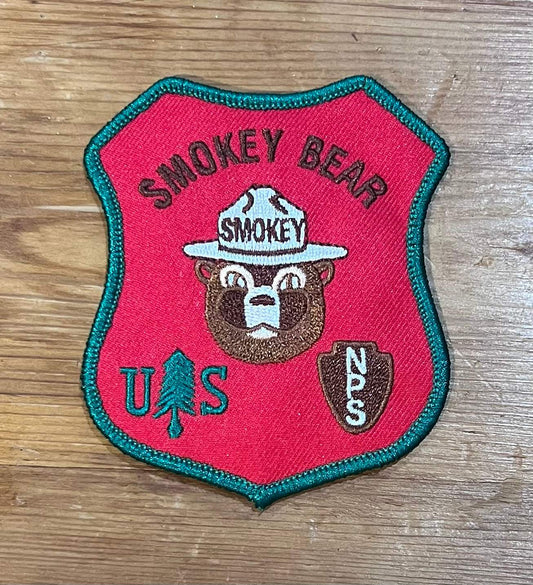 Smokey Bear US National Parks Service Vintage Patch NOS Nature Wildlife Relic has been safely stored away for decades and measures approx 3 inches x 3.5 inch shield