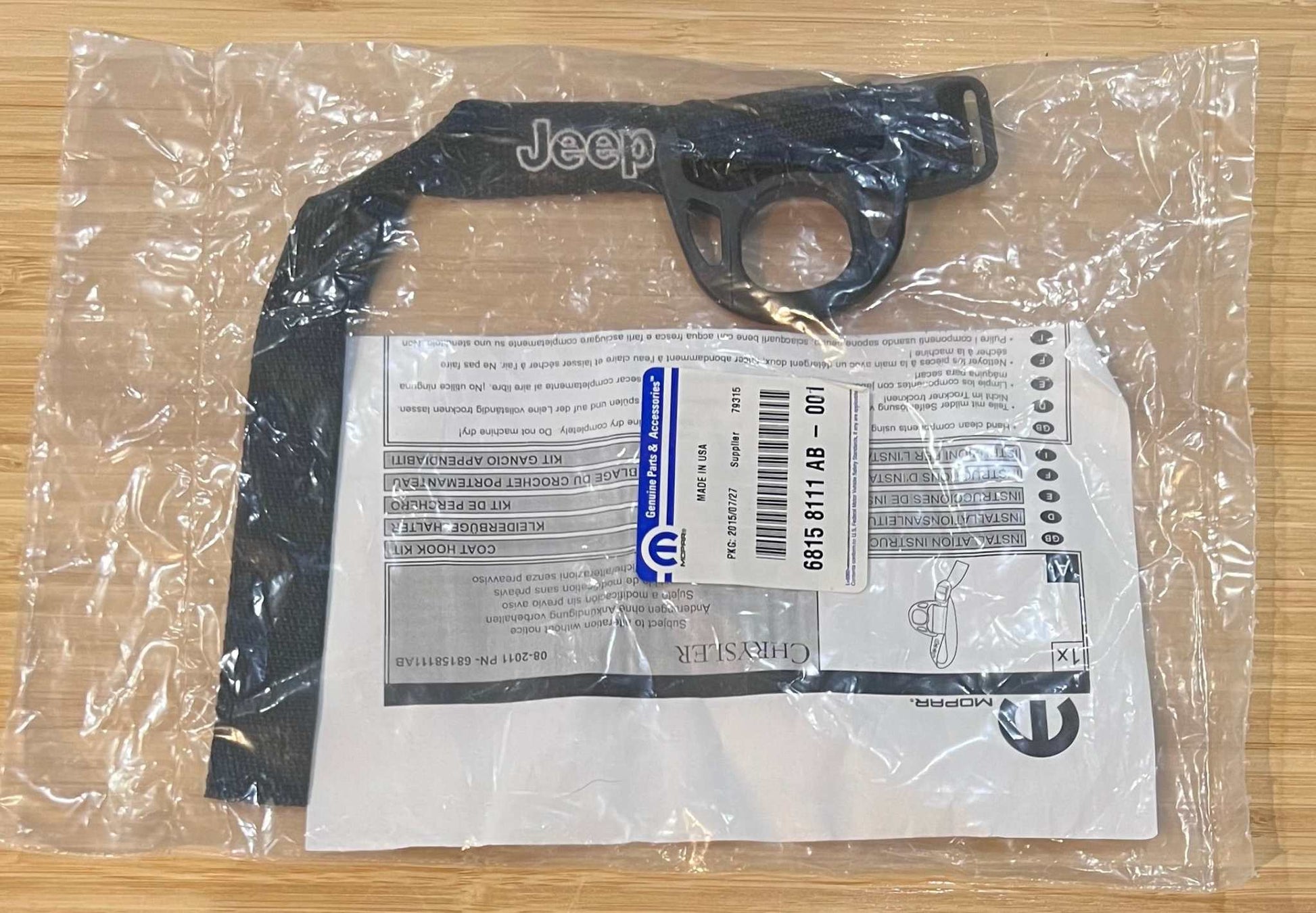 Jeep Strap for Storage and Holder from 2015 Sahara Collectors N.O.S. Relic has been safely stored away for last 10 years and would make for a great replacement or gift