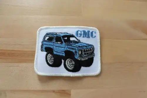 GMC MONSTER TIRE TRUCKS PATCH NOS VINTAGE EXC AUTO GLITTER STITCHING NOS GMC patch measuring 4 x 3 inches.  A great piece to add to your vintage pickup collection