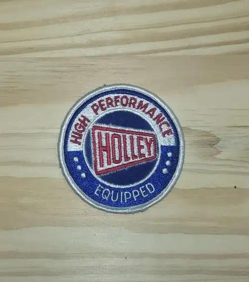 Holley HIGH PREFORMANCE EQUIPED Parts Patch Circle Vintage Auto NOS. This relic has been stored for decades and measures 3 inches circle. Rare Relic from PG Relics