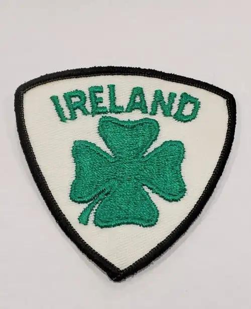 IRELAND Clover Patch Lucky  Mint Vintage Item St Patrick's Day N.O.S. Item measures approximately 3 x 3 inch shield, bright vibrant green with the black border.