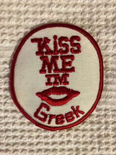 KISS ME IM GREEK PATCH Novelty Unique Item Vintage Throwback Nos Patch block lettering and great stitching. NOS Item, never sewn or displayed, stored with care