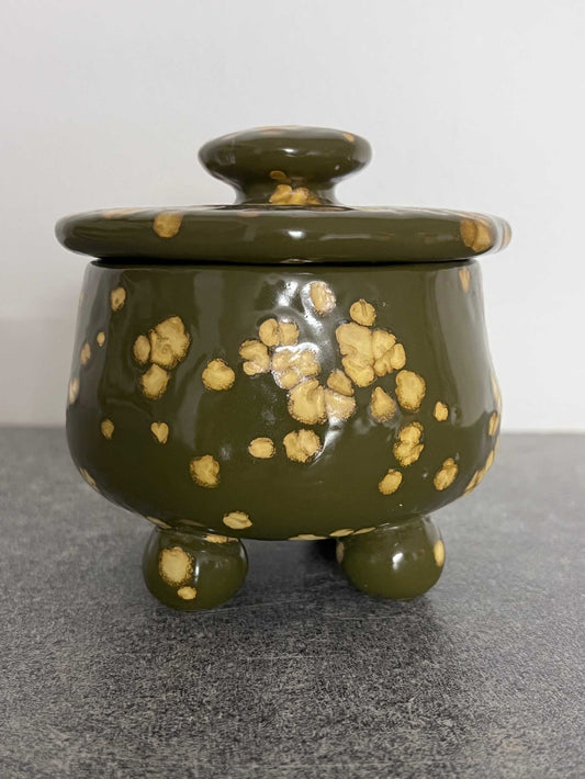 Adorable Ceramic Pottery Dish with Lid, button top handle and three round legs.  This is a great unique one of a kind item in excellent vintage condition.