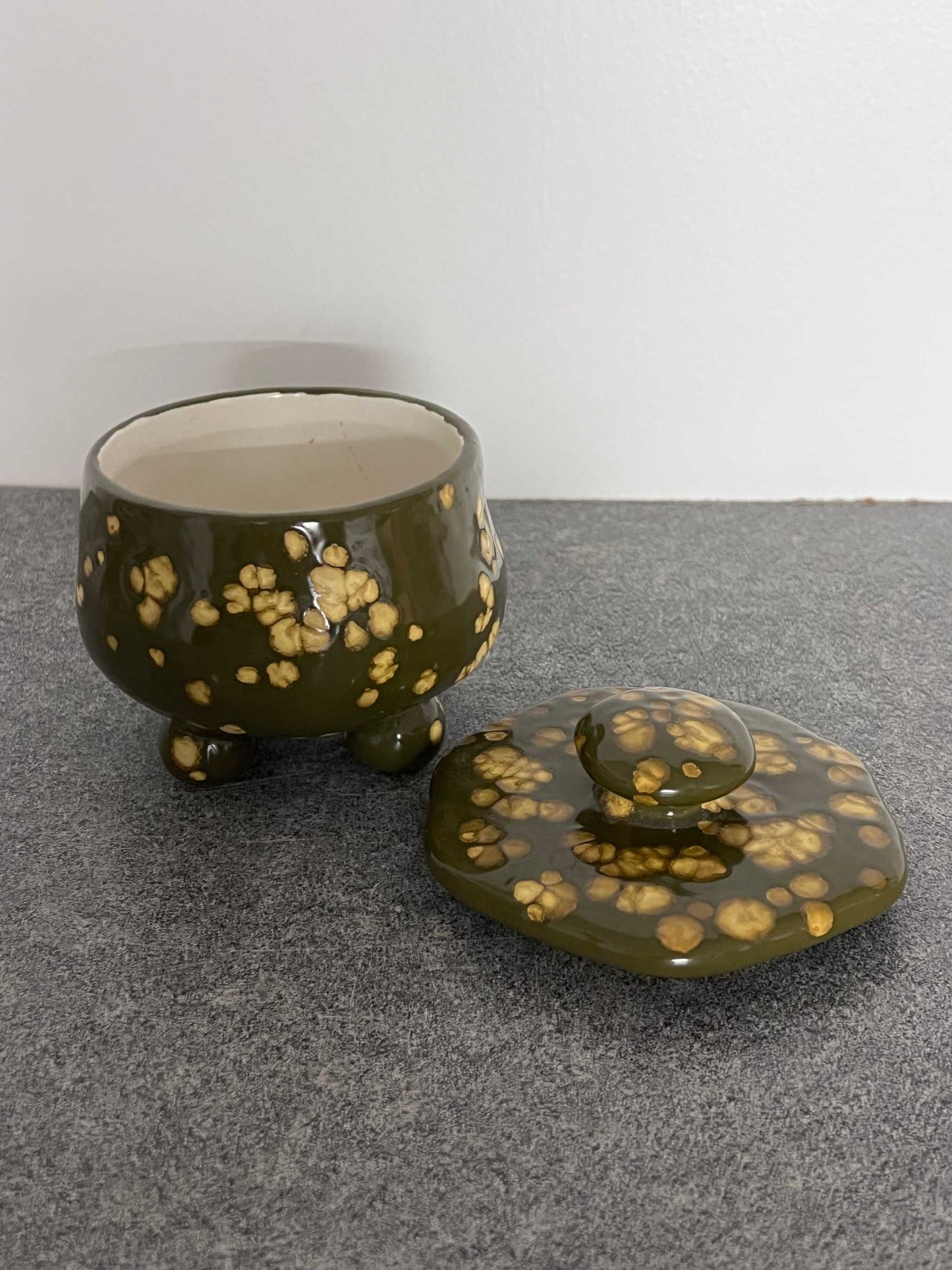 Adorable Ceramic Pottery Dish with Lid, button top handle and three round legs.  This is a great unique one of a kind item in excellent vintage condition.
