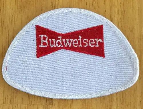 BUDWEISER BOWTIE Patch LOGO Unique Beer Collectible VINTAGE NOS and in MINT condition. BUDWEISER BOWTIE patch Other unique BEER and Eclectic relics available as well