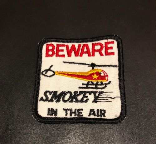 BEWARE SMOKEY IN THE AIR Patch Eclectic Chopper Vintage Beware A GREAT item for the retro patch collector in your life. Item measures approximately 3 x 3 inches